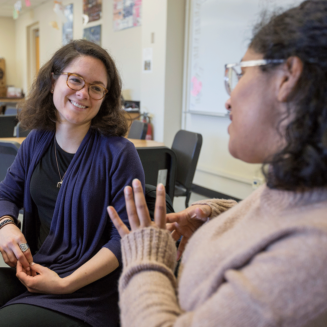 SF State professor speaks with student after class