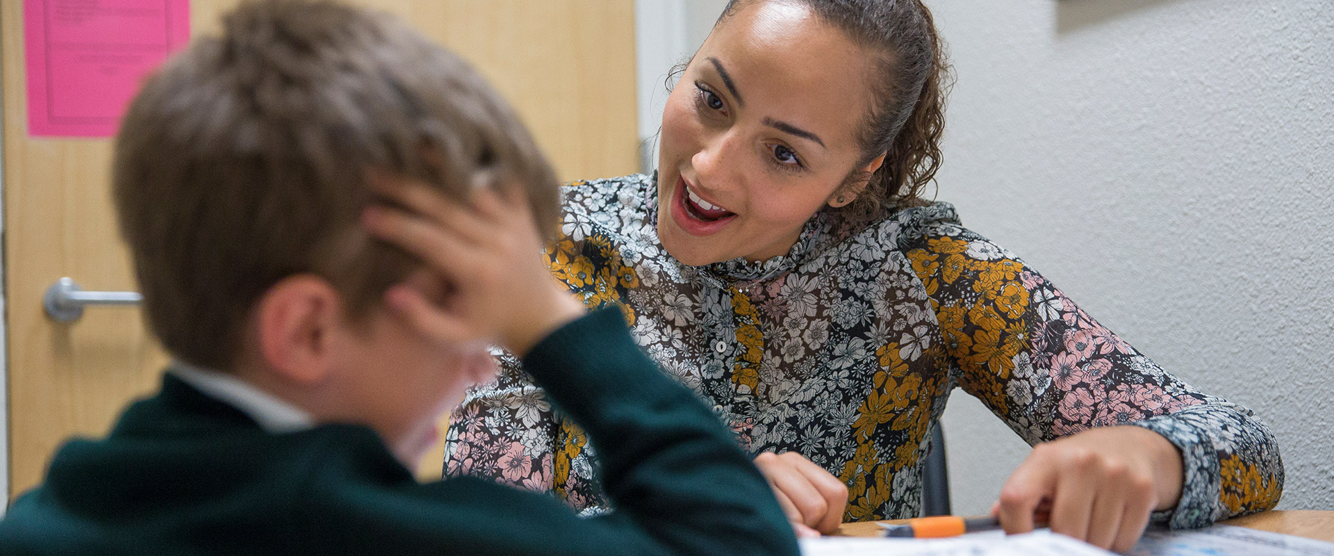 School Psychology intern works with child 