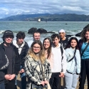 International students on a rocky beach