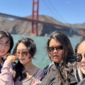 International students on a bay cruise by the Golden Gate Bridge
