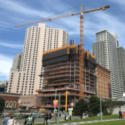 A building site with a crane in downtown San Francisco